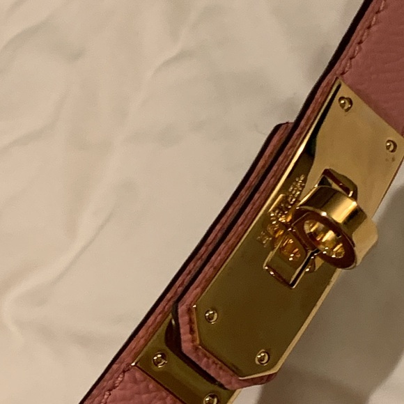 Thin  light pink golden buckle  fashionable belt size L adjustable 30.Must have!